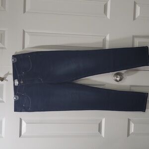 Kendal & Kylie jeans with black dog tag K&K inital charms on front loop